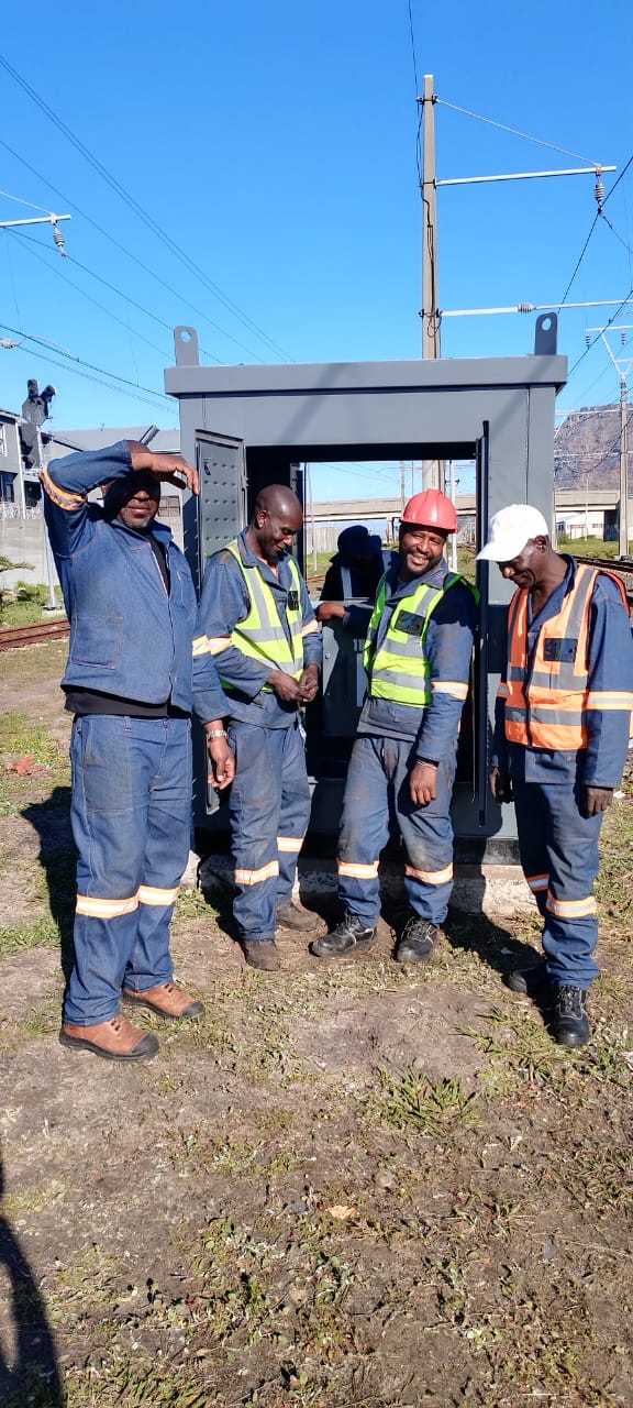 Kiosk hand-over — crew portrait